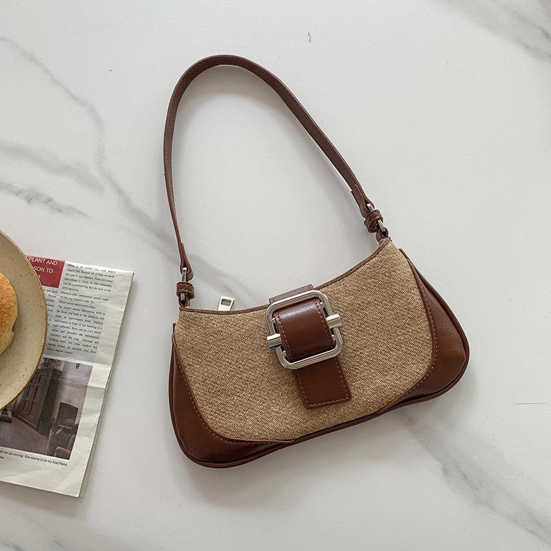 Retro Revival: Underarm Baguette Bag for Timeless Style